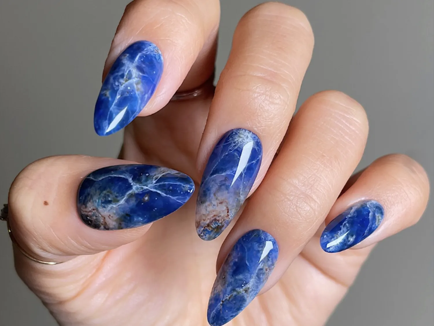 23 Capricorn Nail Ideas to Try, From Topaz Tips to Earthy Auras