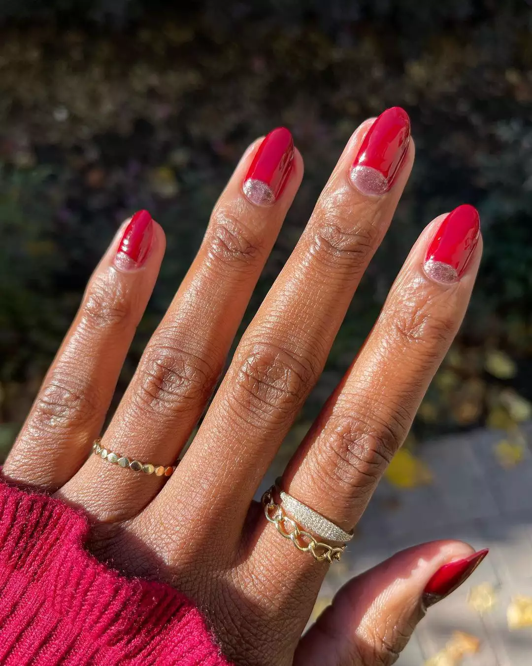 inverted red manicure with glitter on cuticle