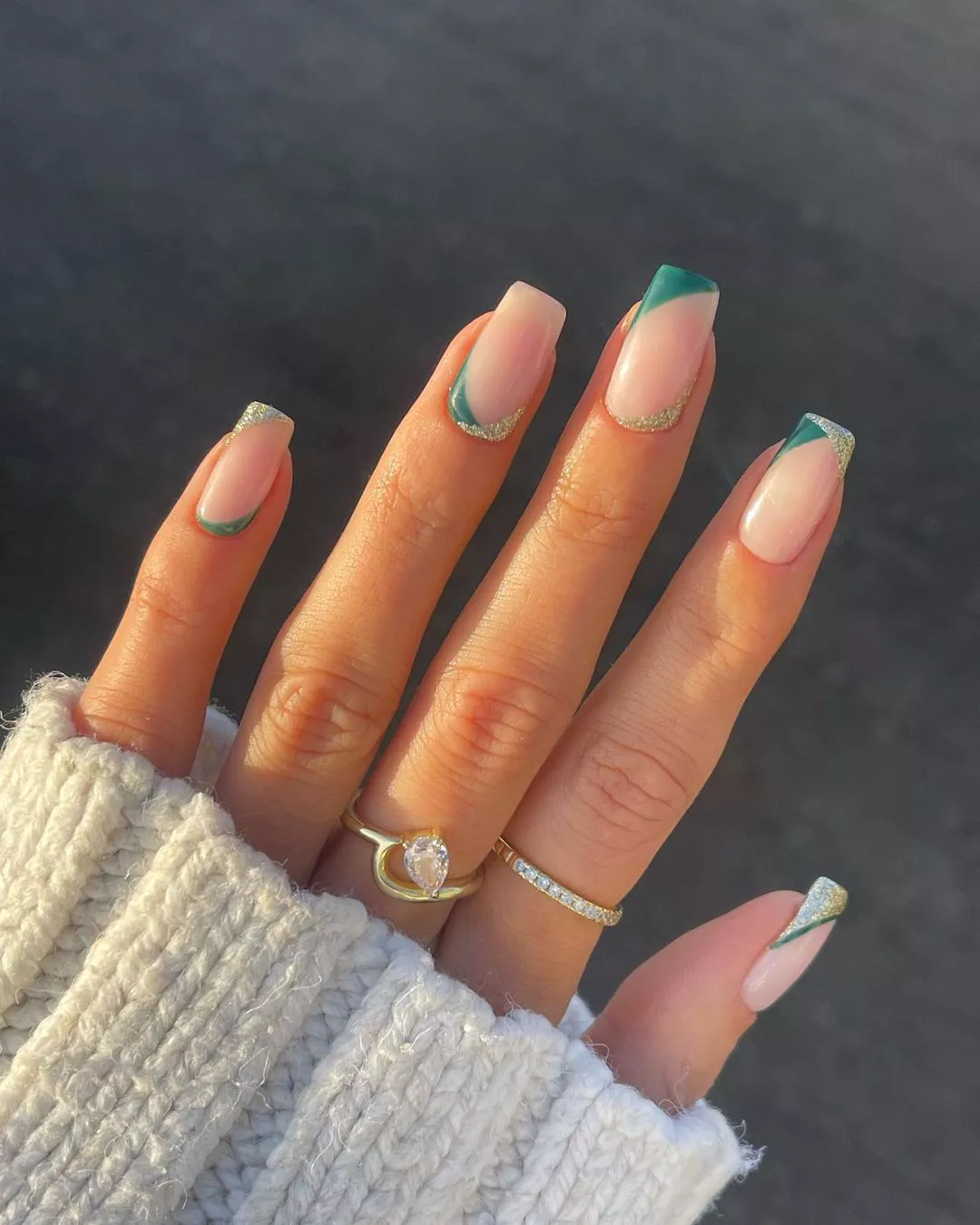 abstract shapes on square nails in green and gold