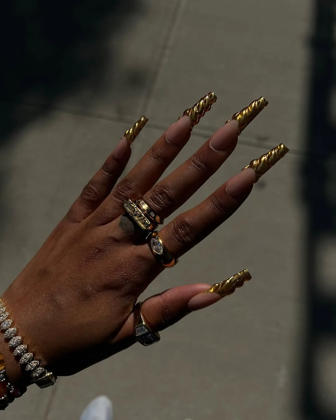 Nude nails with 3D gold French tips