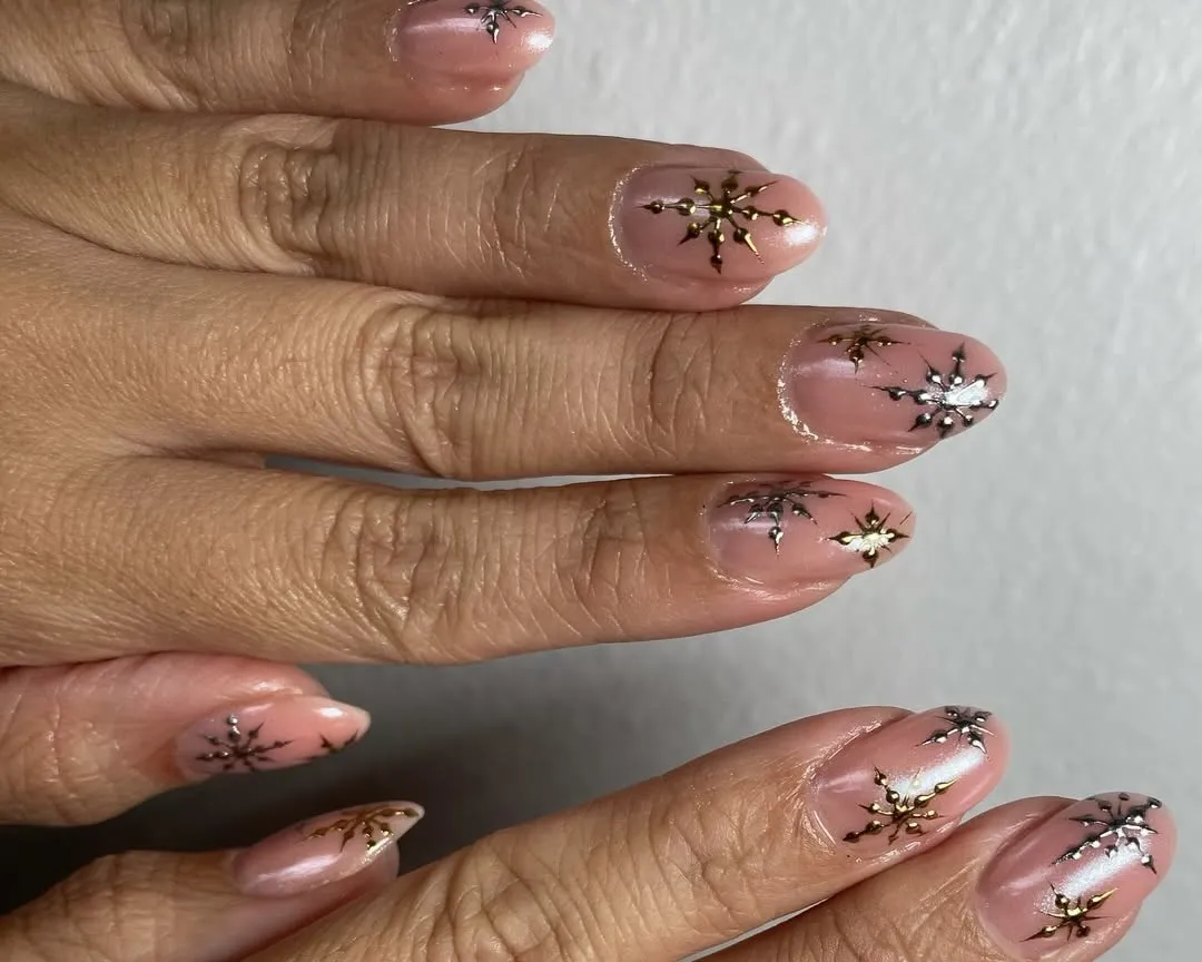 Chrome snowflake manicure.