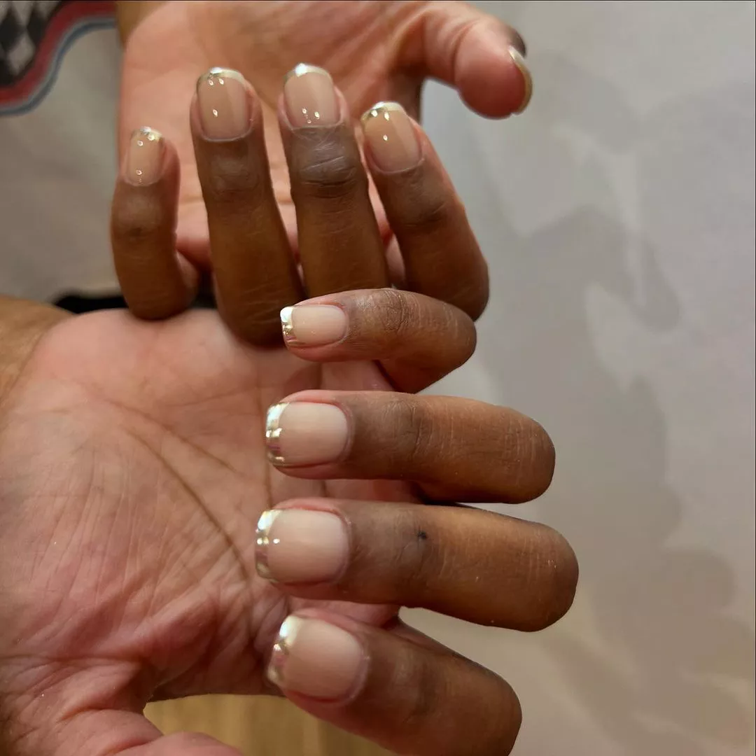 A chrome French tip manicure for winter.