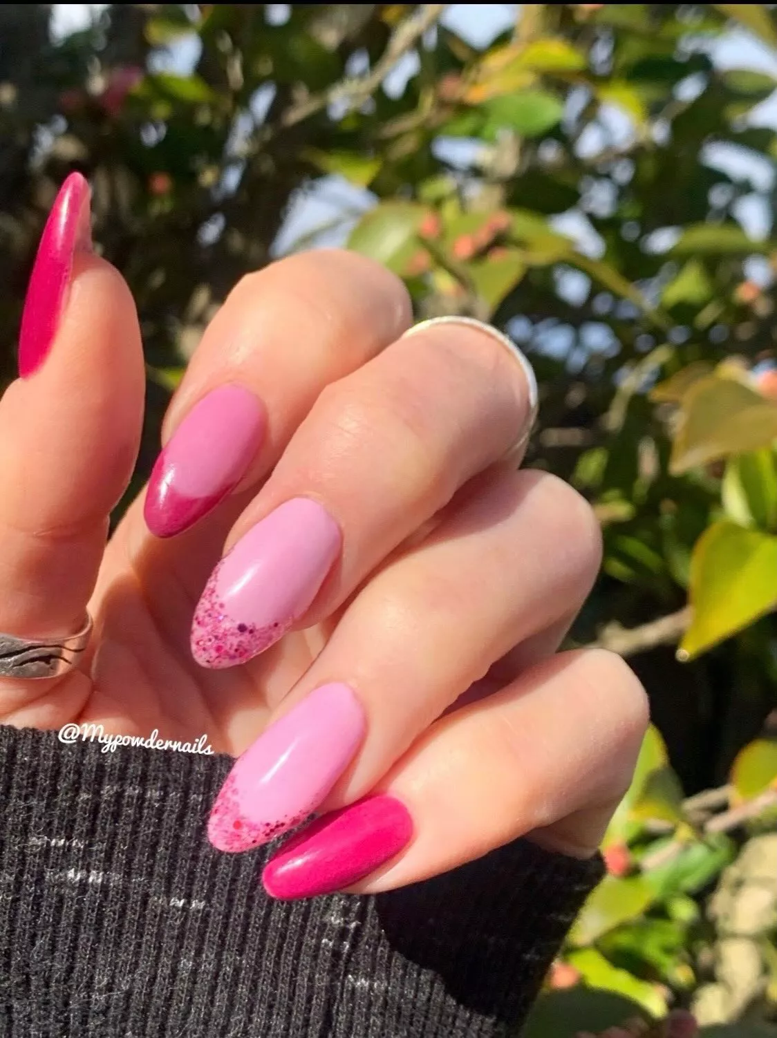 pink two toned manicure with added glitter french tips