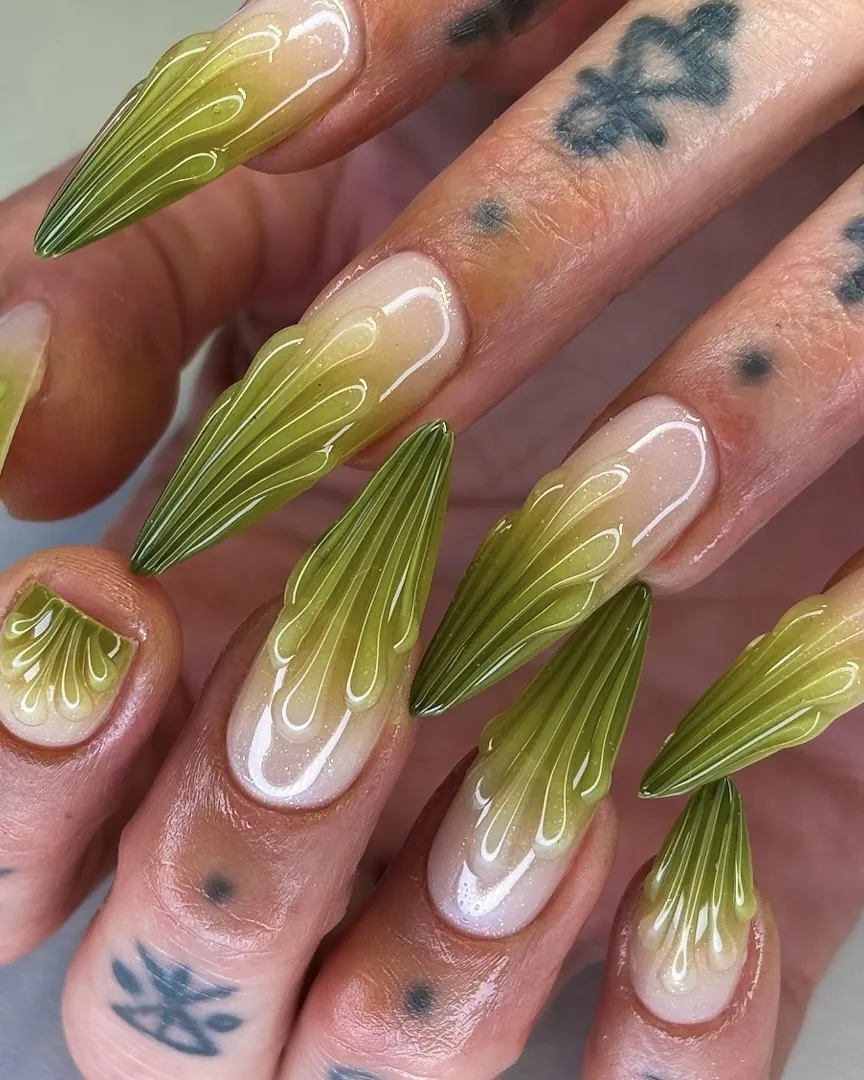 3D green ombre nails.
