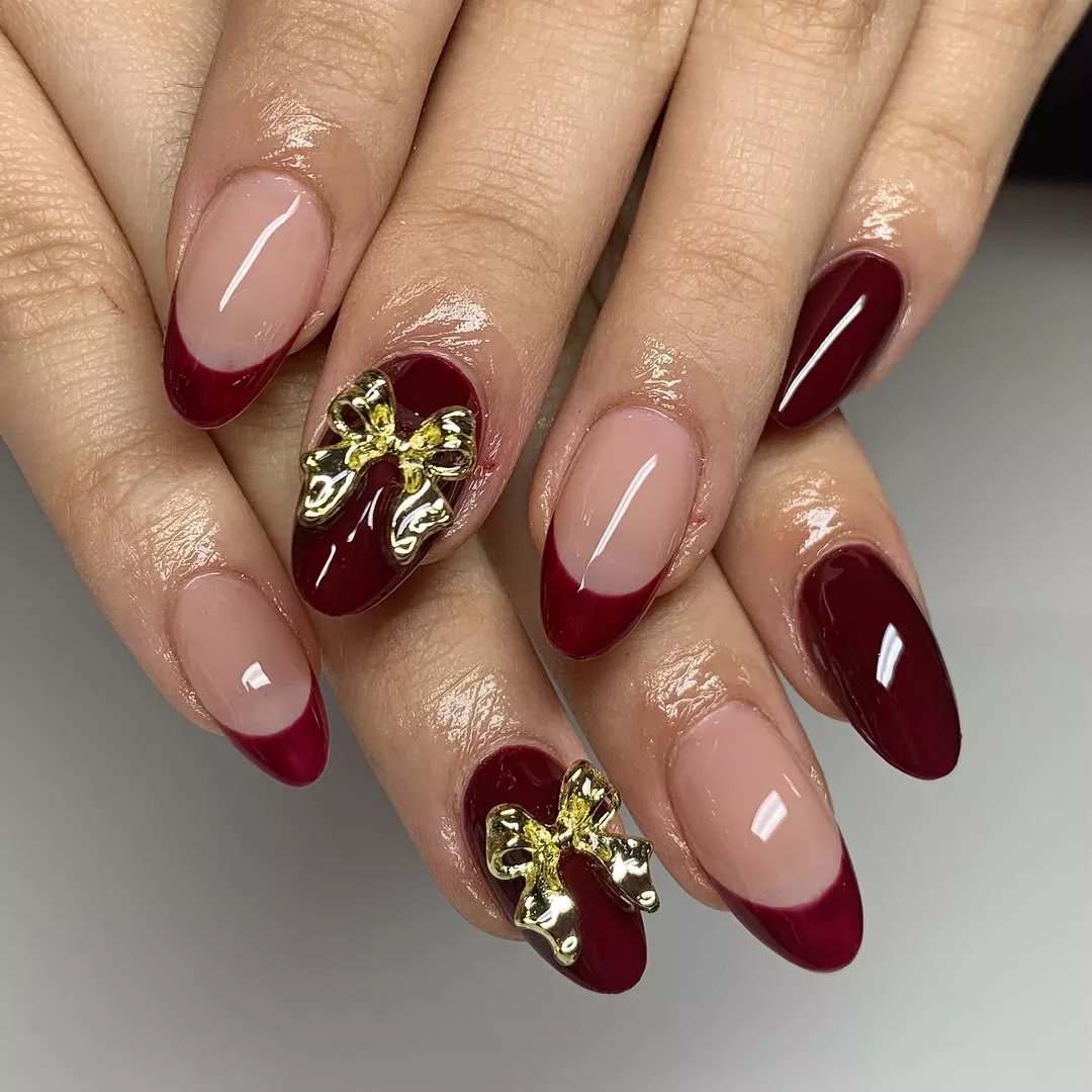 Deep Reds, Bright Golds Bow Nails