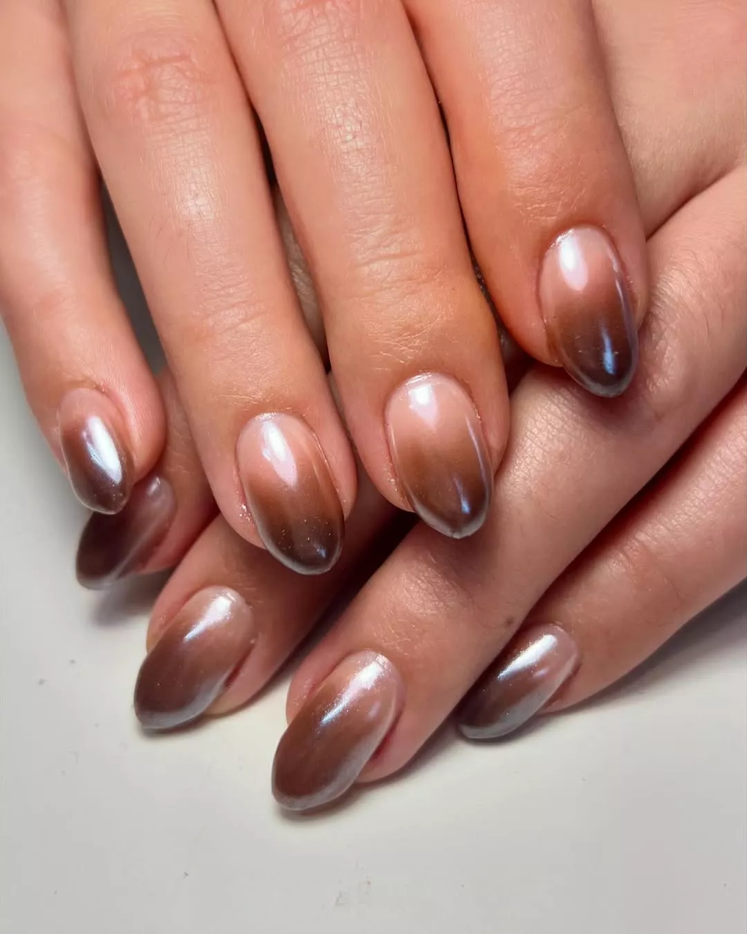 Ombre nails starting from nude to brown