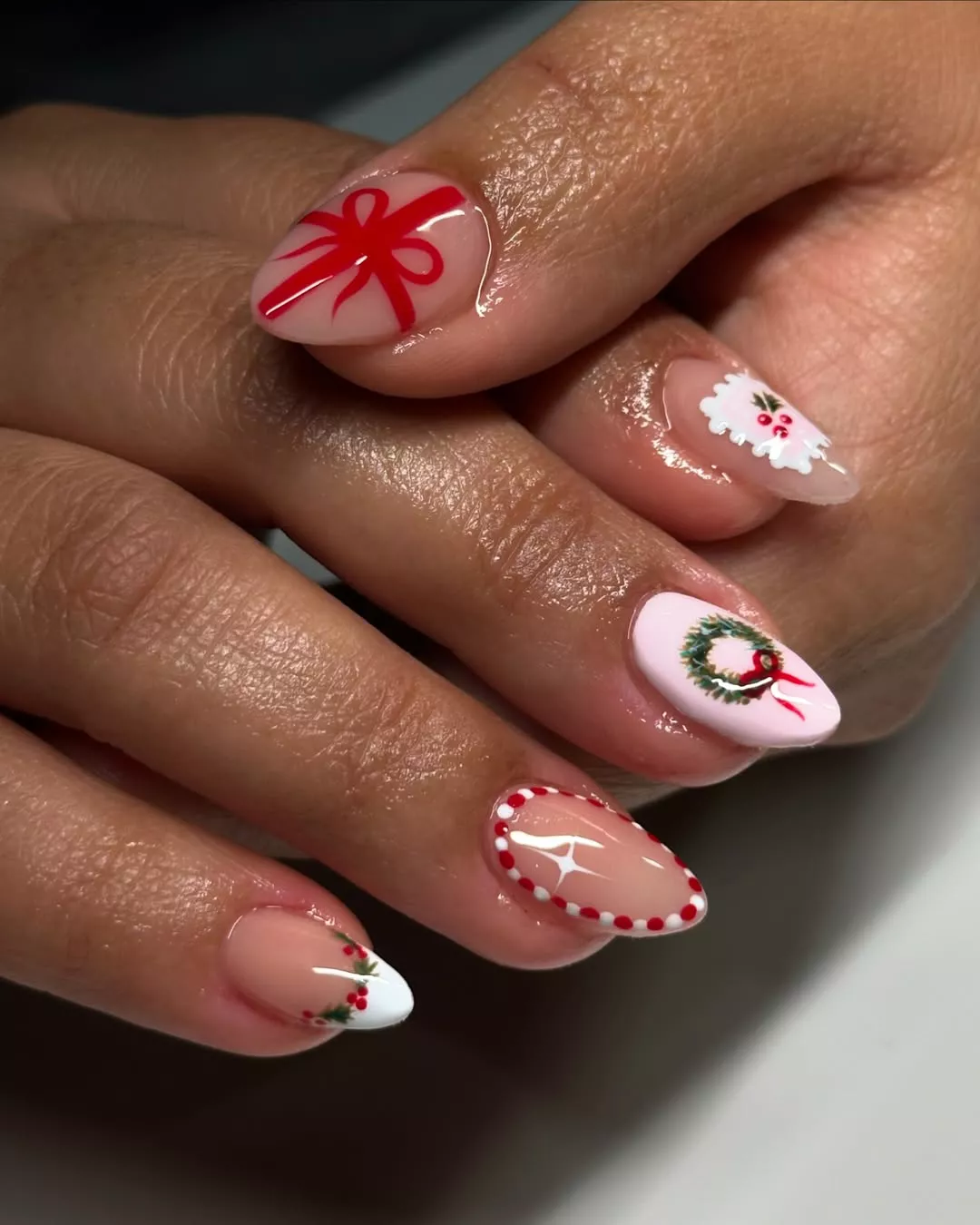 manicure with candy canes, wreaths, stamps, and bows