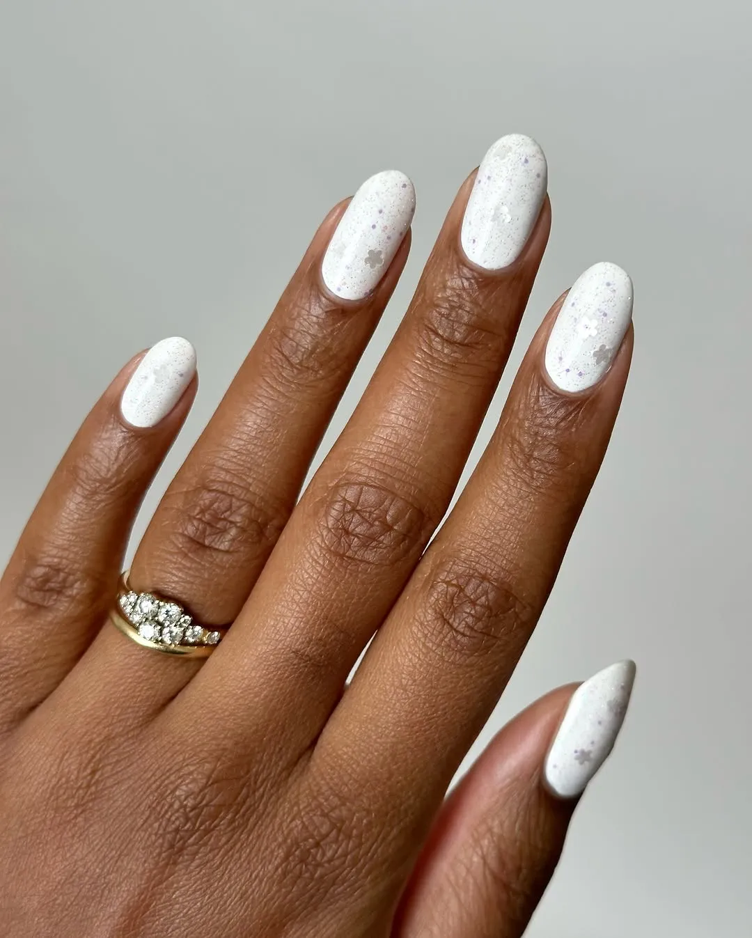 Glittery white nails