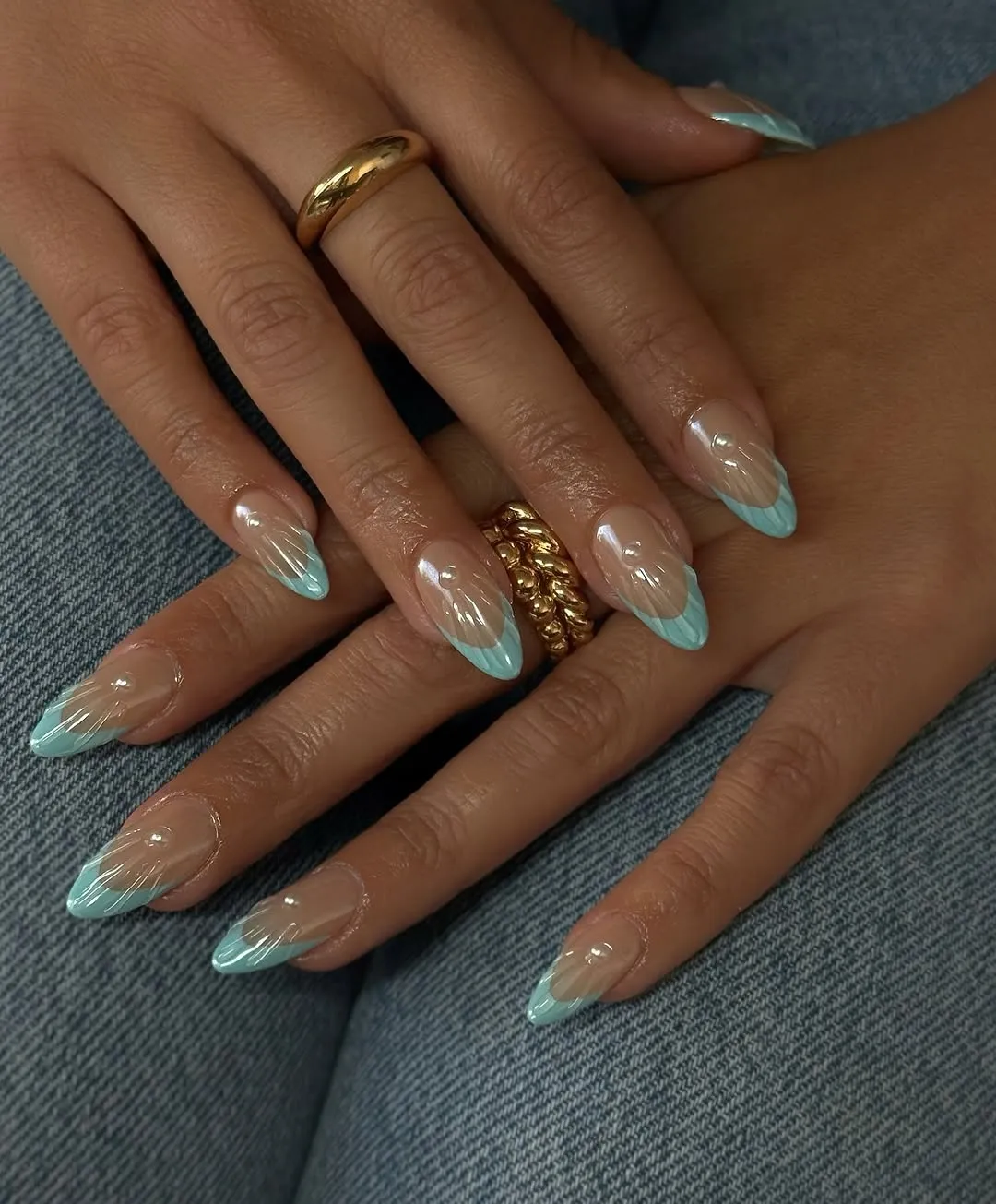 Blue french tip chrome manicure with 3D shell design