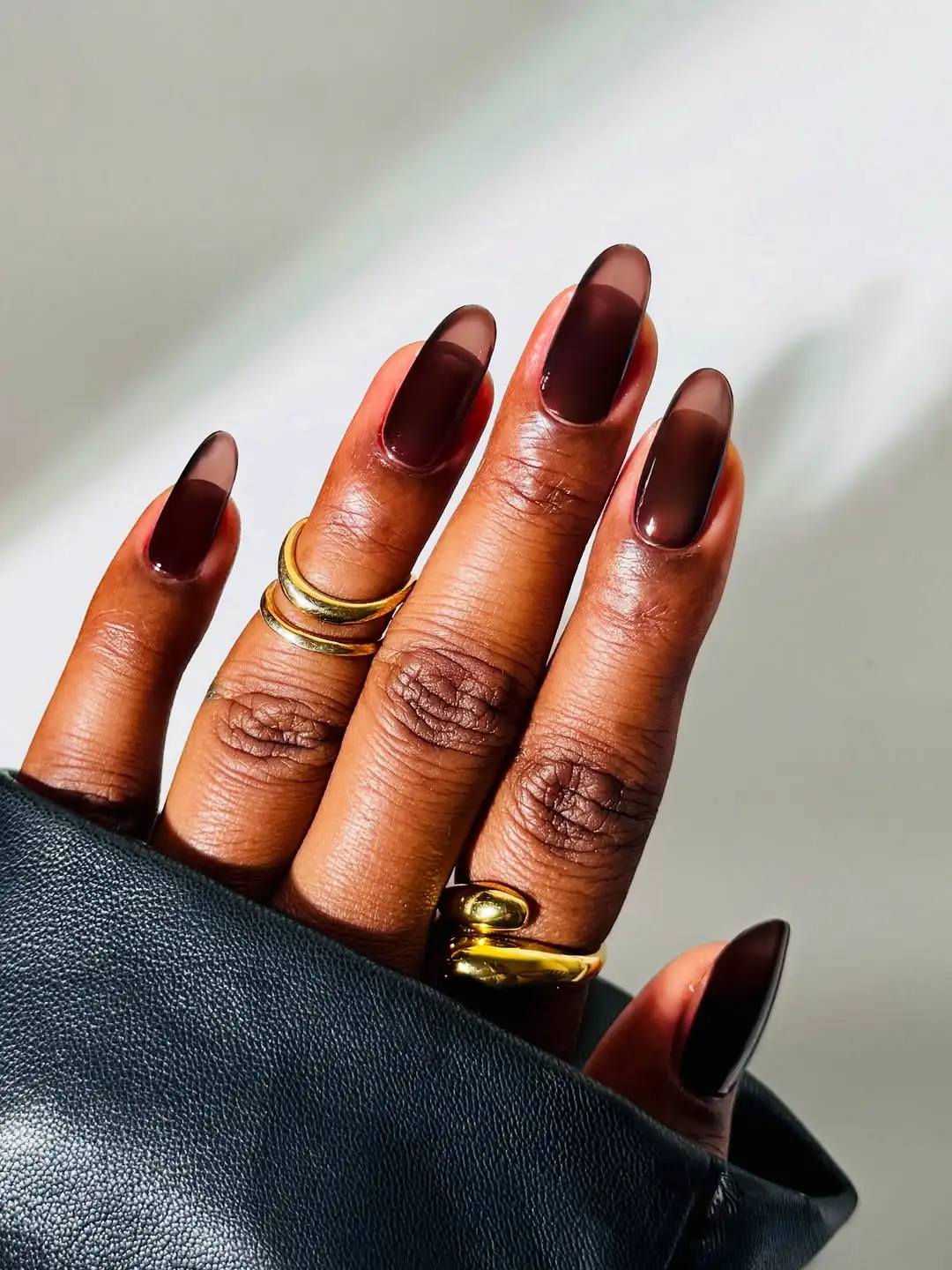 Dark brown jelly nails