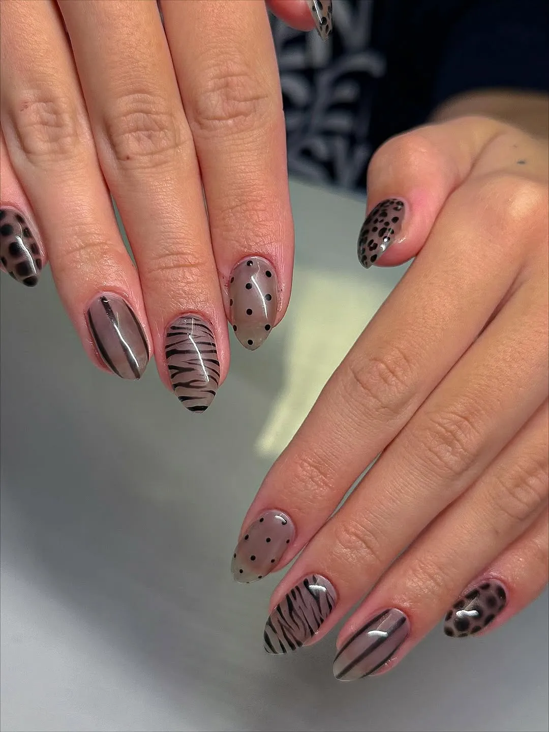 Sheer black animal print nails
