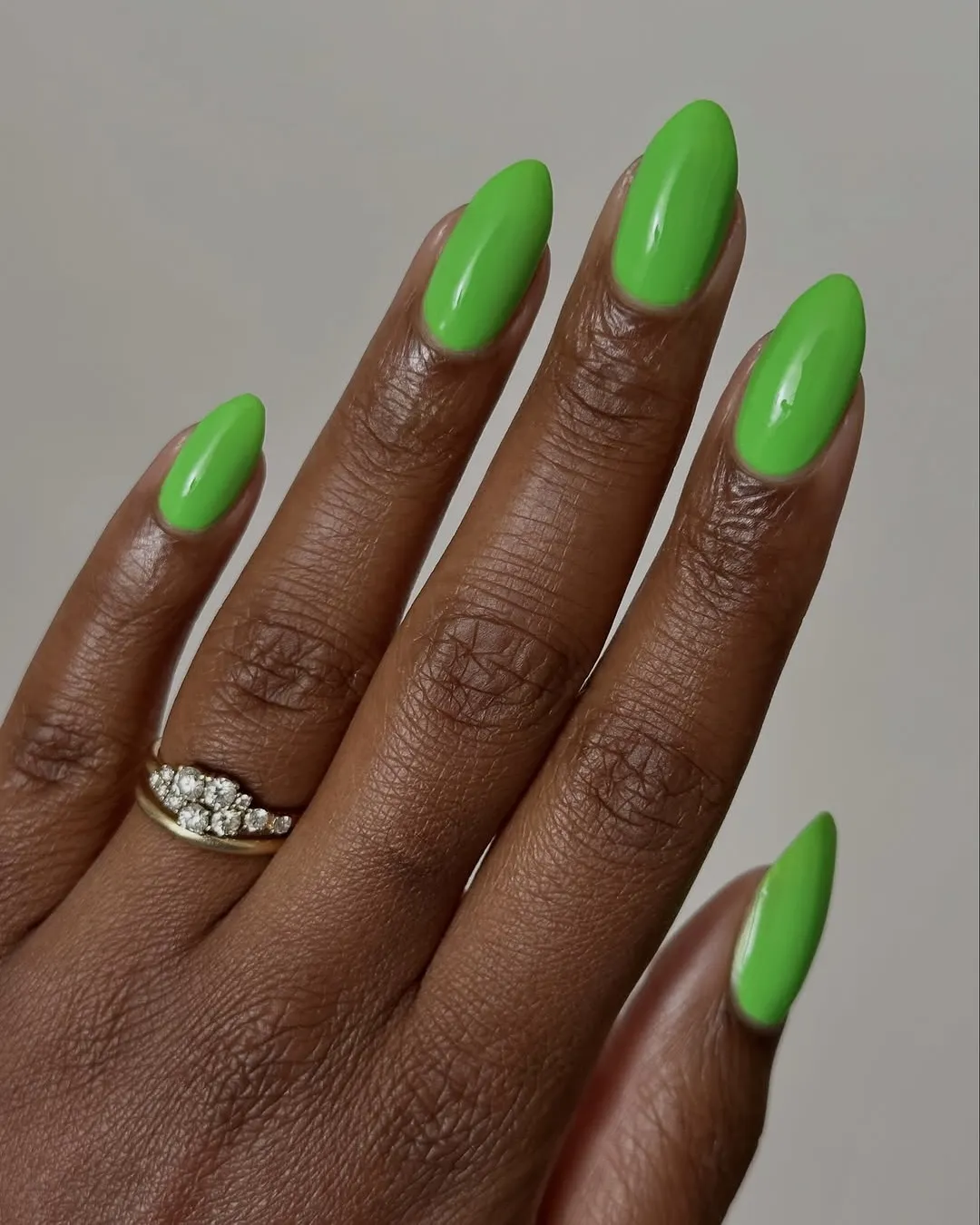 Neon green nails.