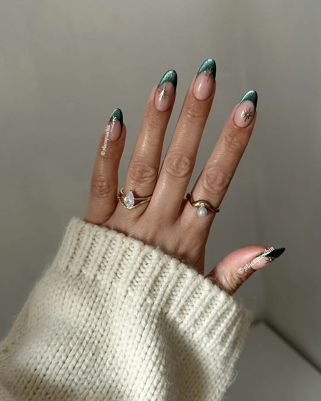 Green velvet French tip Christmas nails.