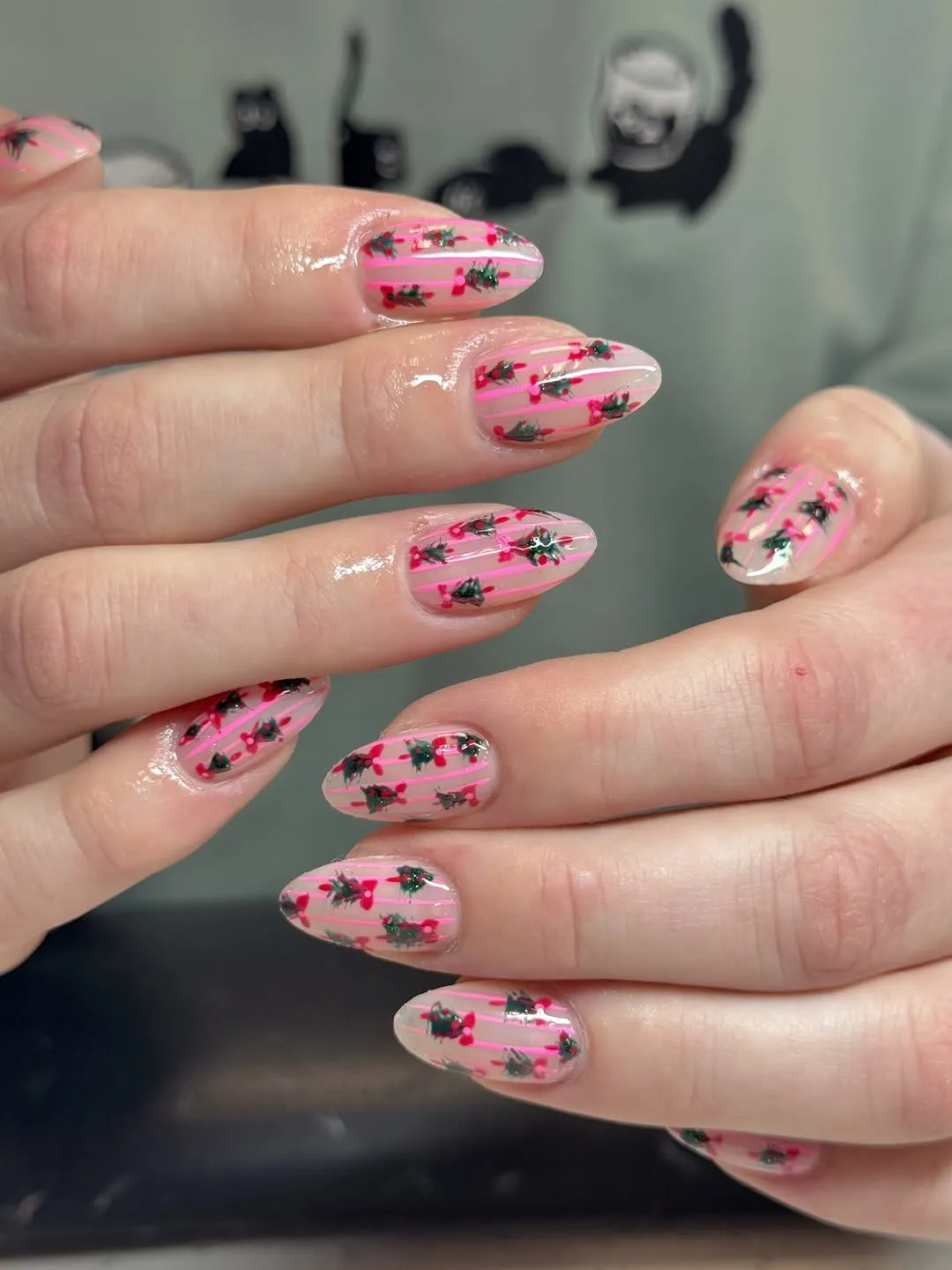 Closeup of hands with decorated nails