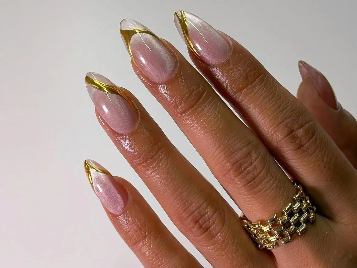 25 Stunning Gold Nail for Winter, Including Gilded Tips, Shimmery Stars, and More