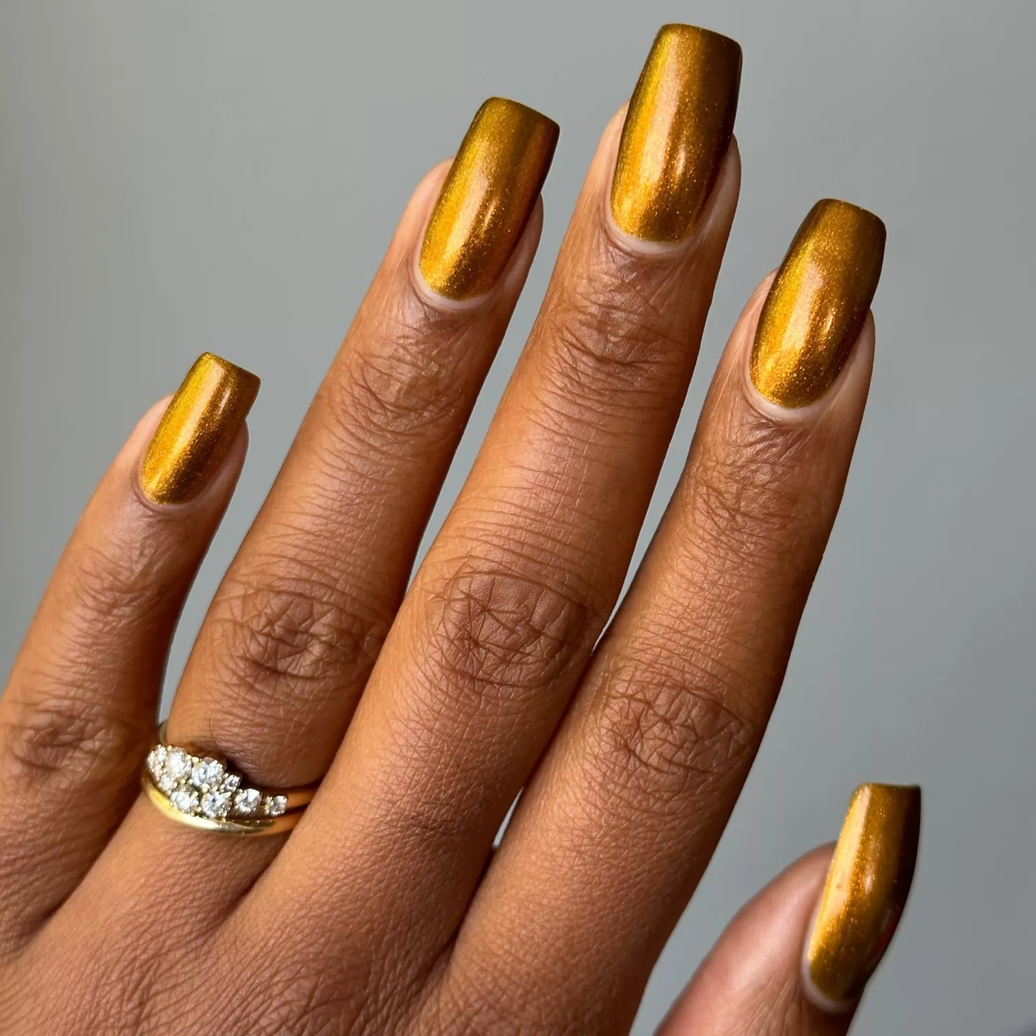 gold nails gold trophy