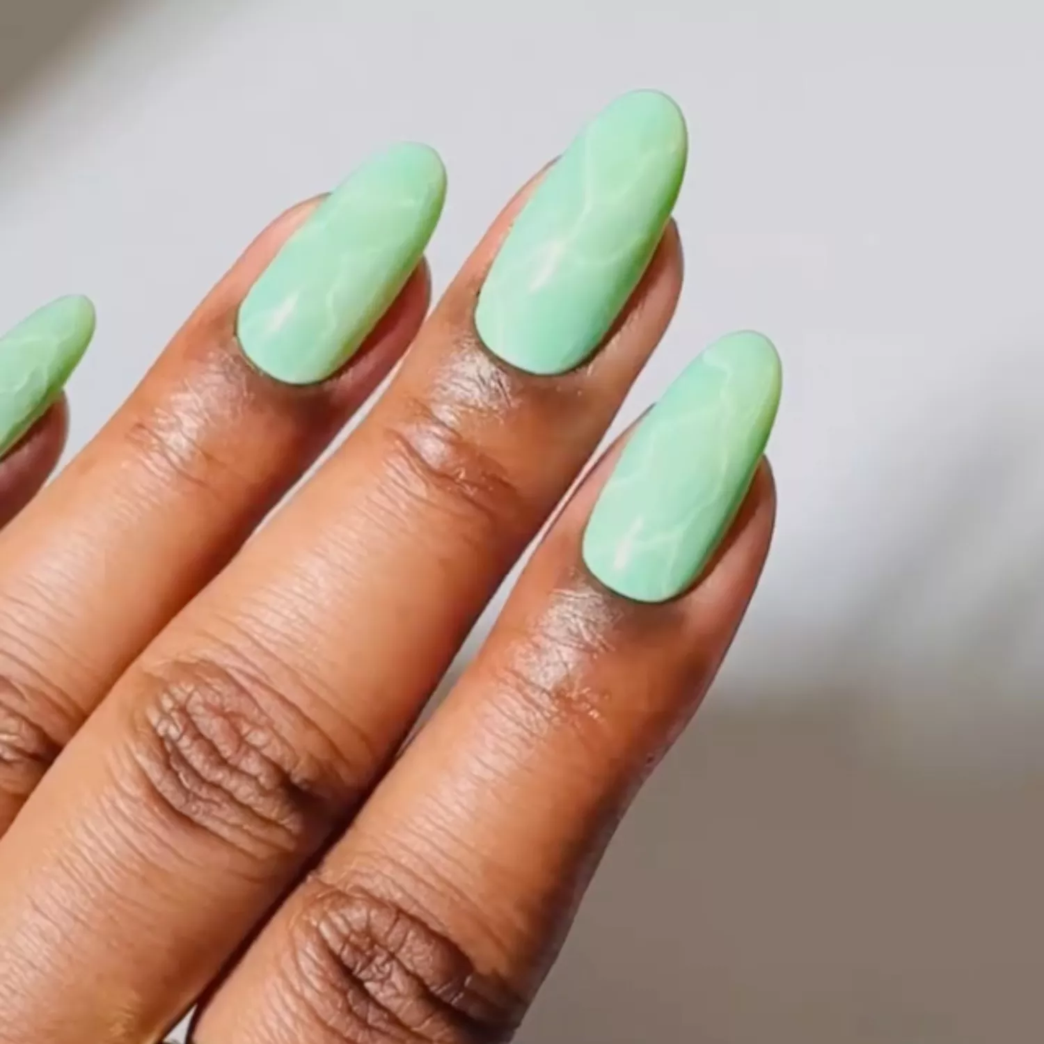 Mint Green Marble Nails - InStyle January Nails