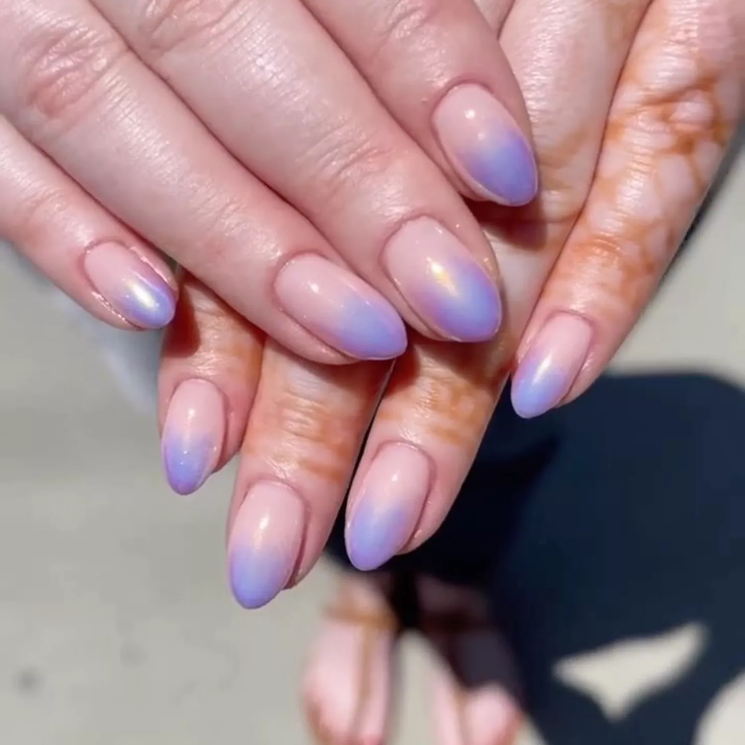 Ombre iridescent French manicure on almond-shaped nails