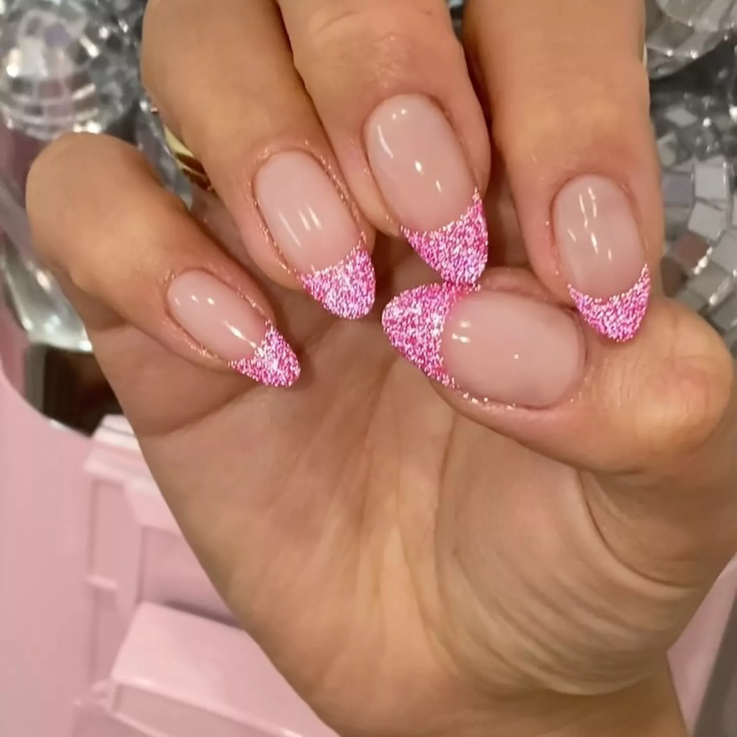 Pink velvet French manicure on almond-shaped nails