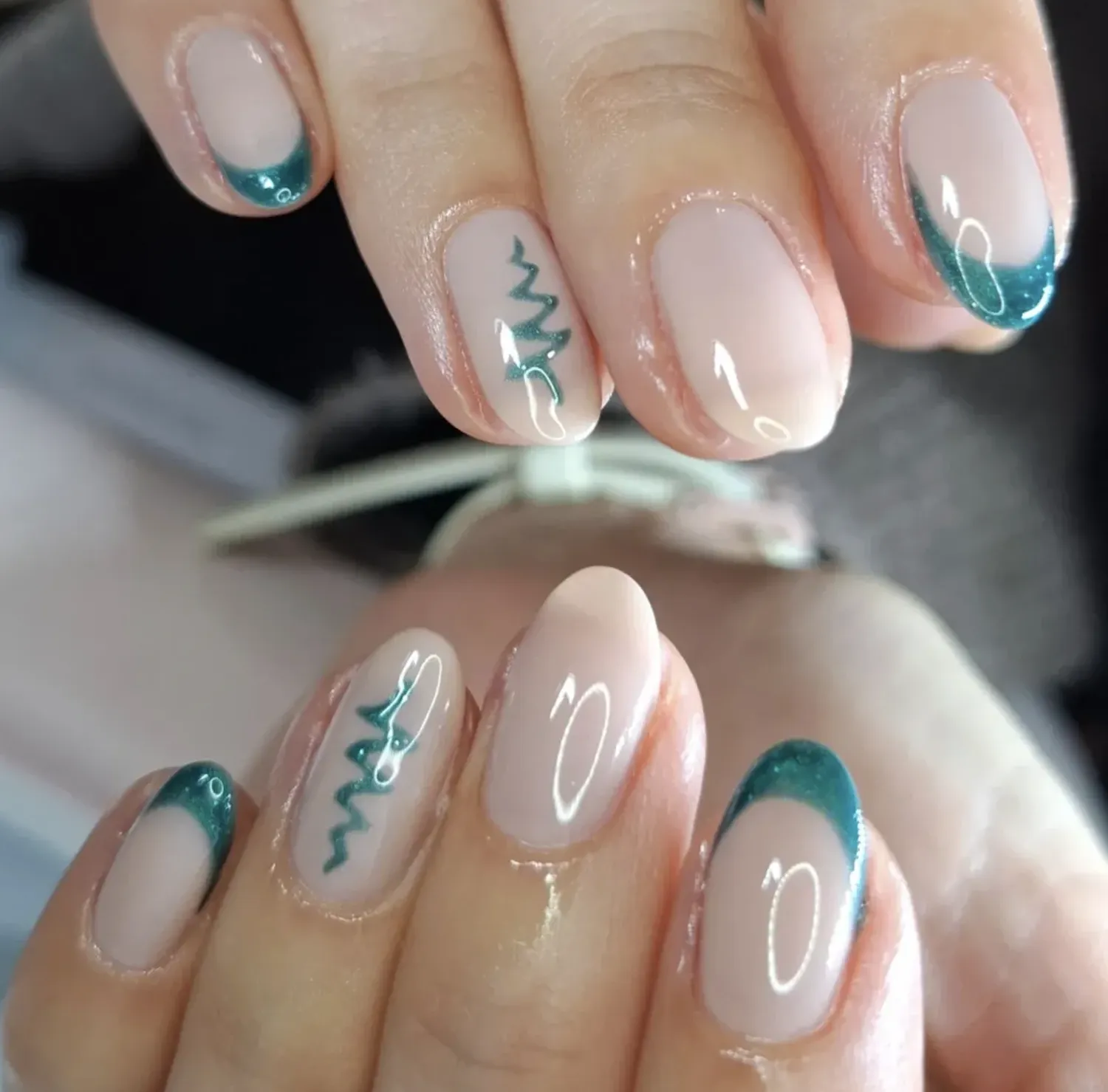 Clear polish with green sparkly tips and modern tree designs