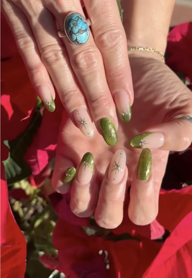 French manicure with chartreuse tips and star accents