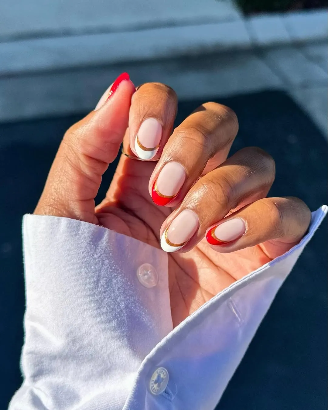 Red and white french tips with gold lines