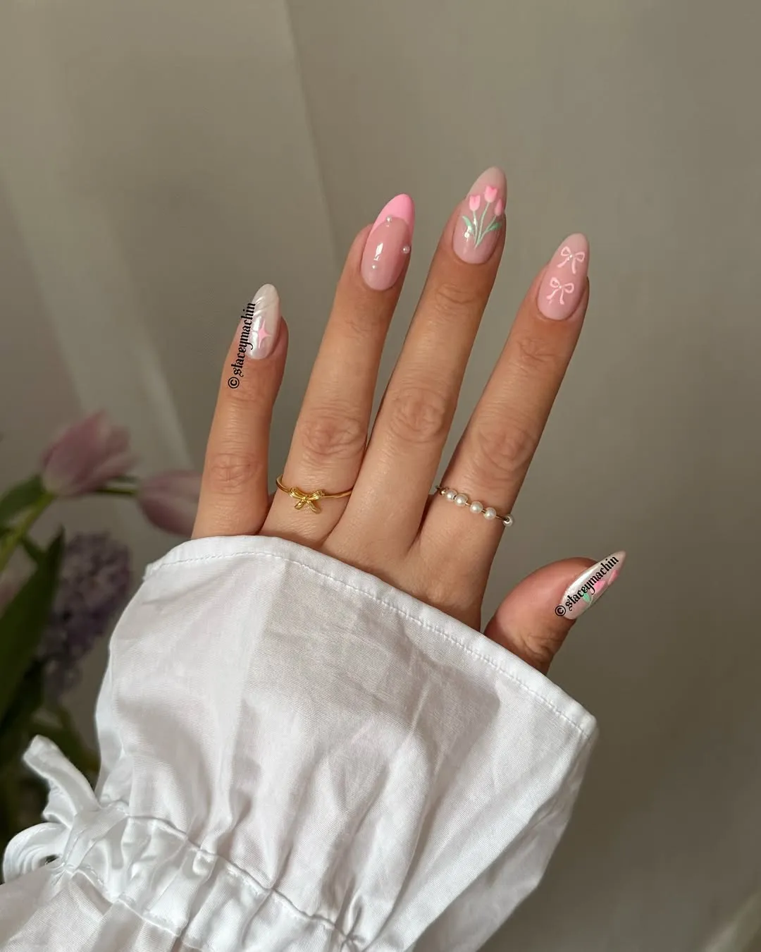 Light pink french nail with tulips and bows