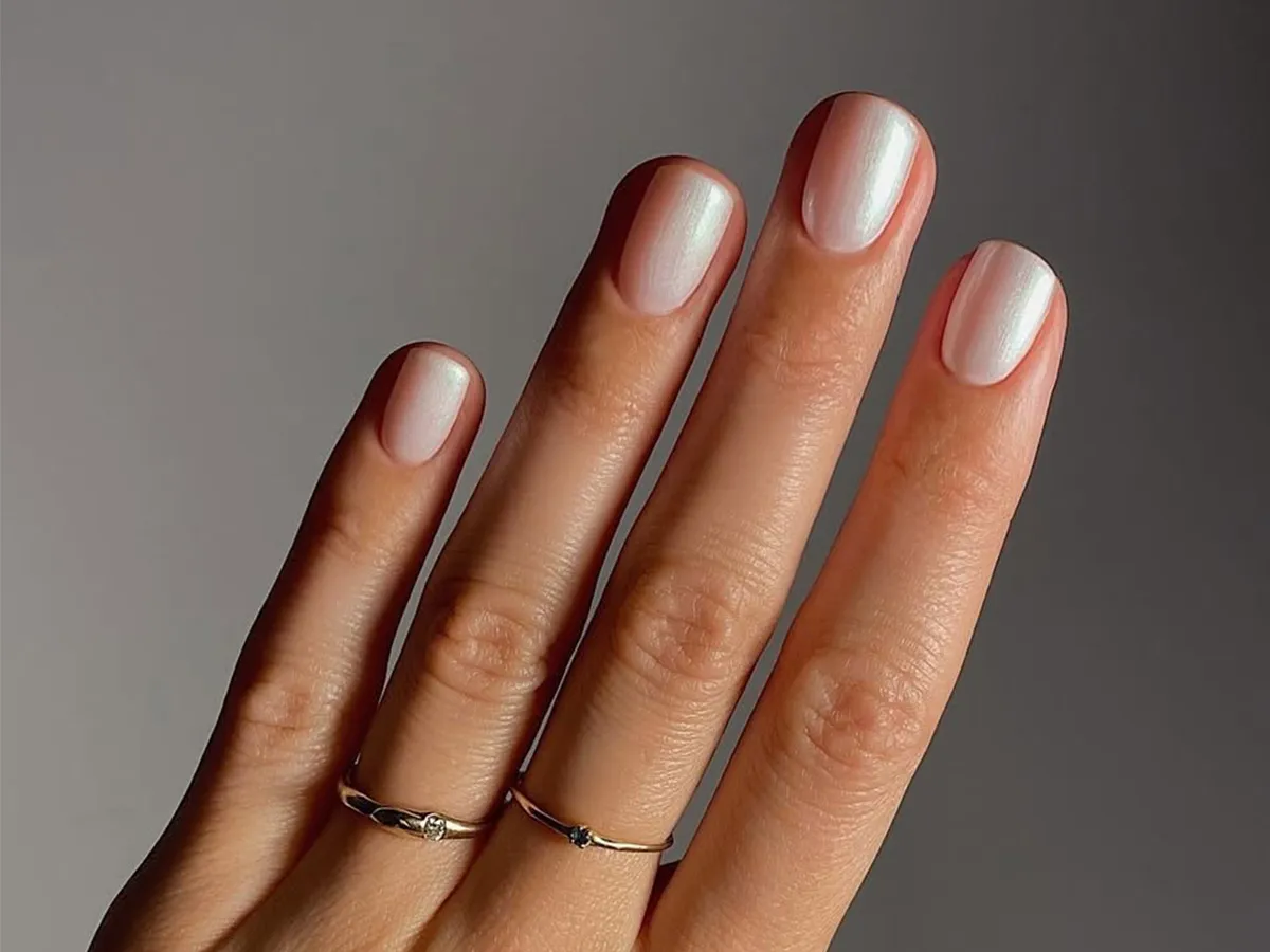 6 Stunning Nail Colors for January, From Creamy Latte to Midnight Blue