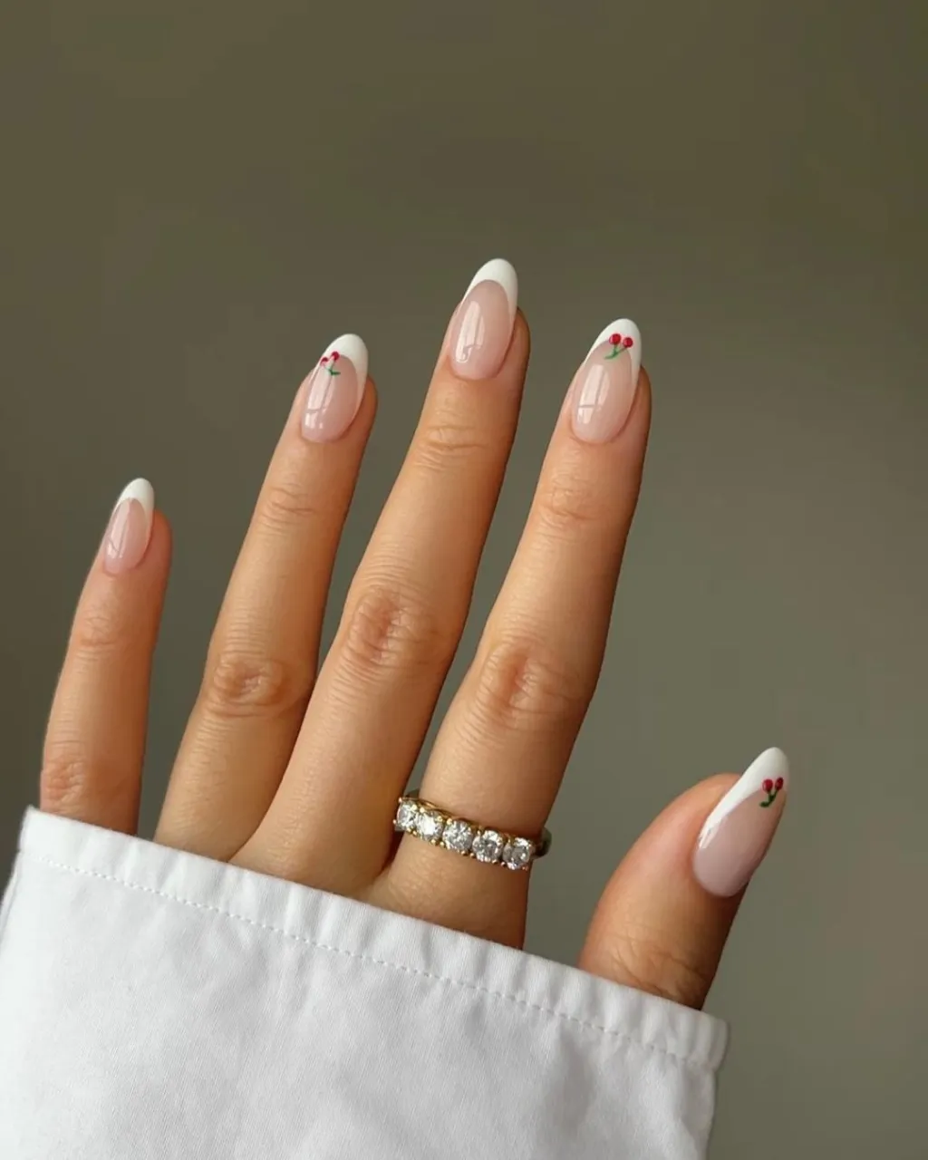 cute simple red cherries on white french tip nails