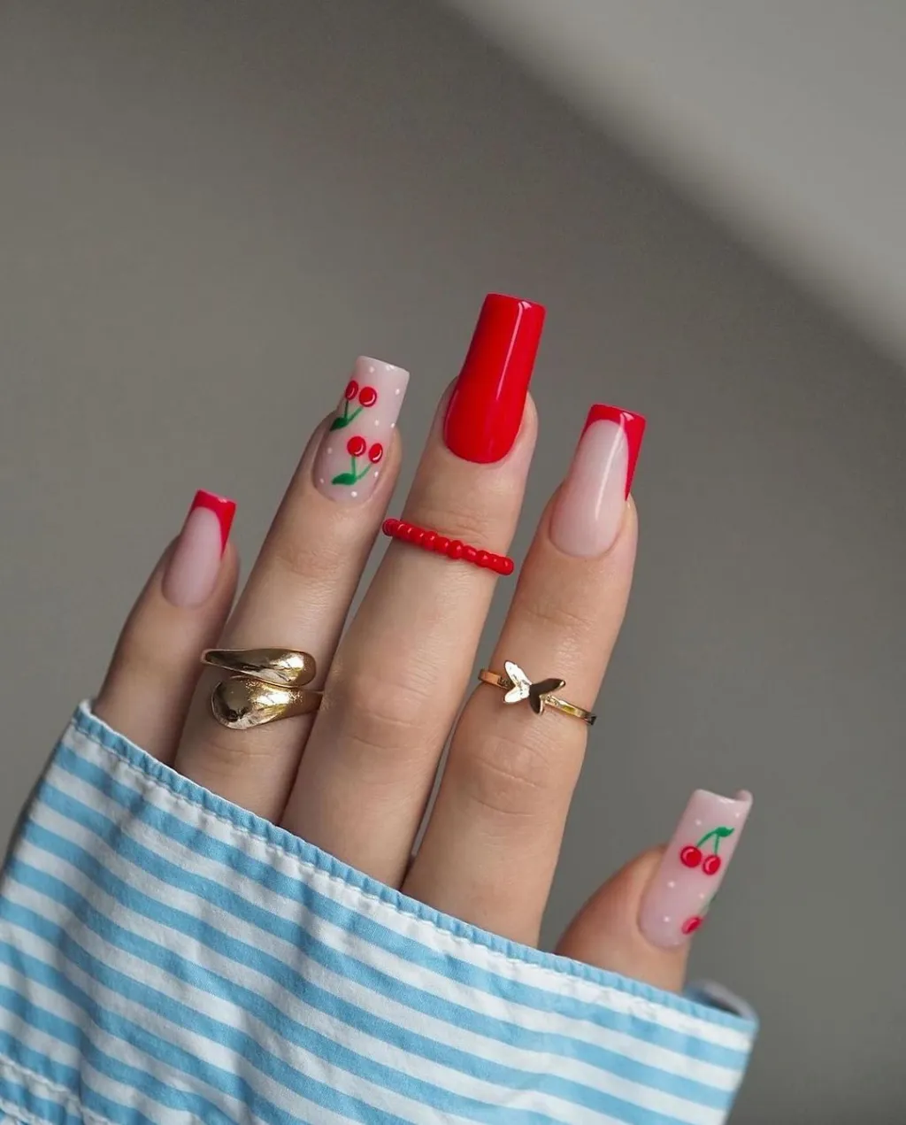 cute coffin shaped cherry nails with simple red french tip designs