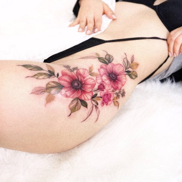 Beautiful flowers hip tattoo by @tattooist_silo