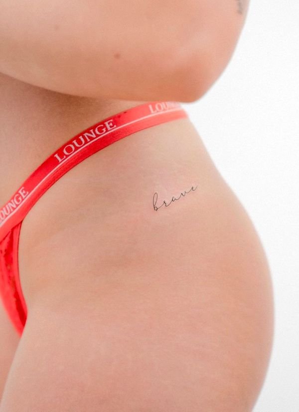 Brave one-word hip tattoo by @thedayafter_tat2