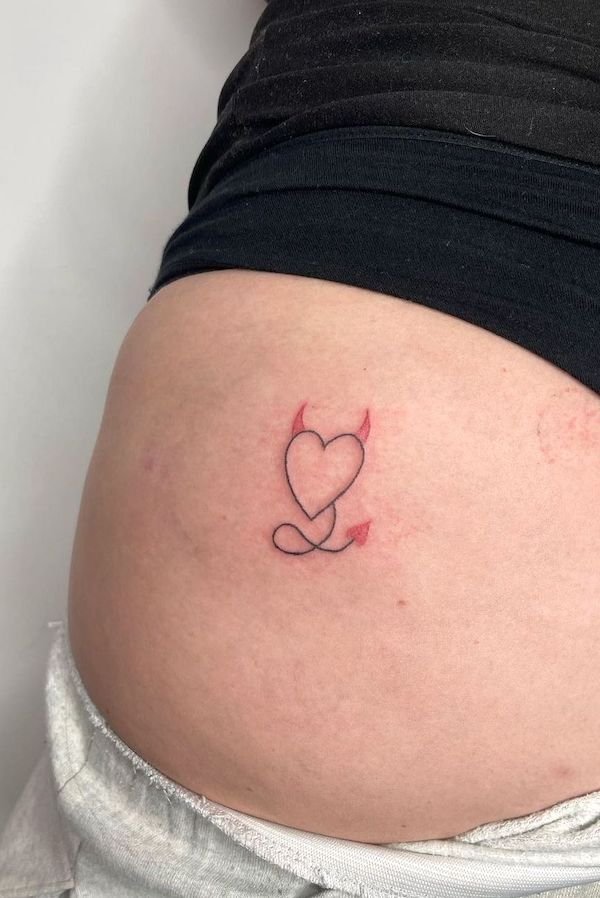 Devil heart hip tattoo by @stabinskytattoo
