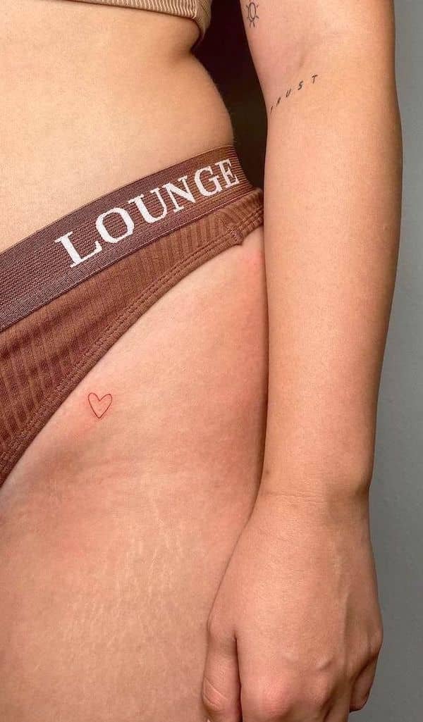 Tiny heart hip tattoo by @vvinkxo1