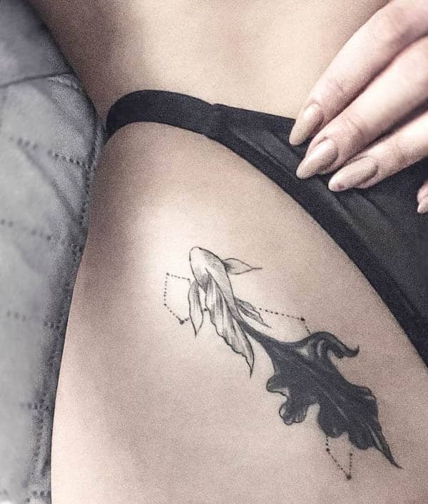 Yin and Yang Pisces hip tattoo by @nadinaazara