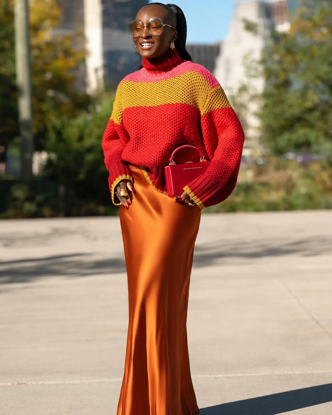 Bold Color Block Sweater With Satin Skirt