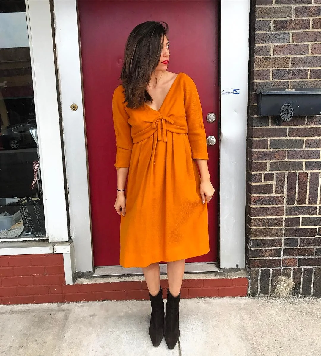 Bold Orange Knit Dress With Suede Boots