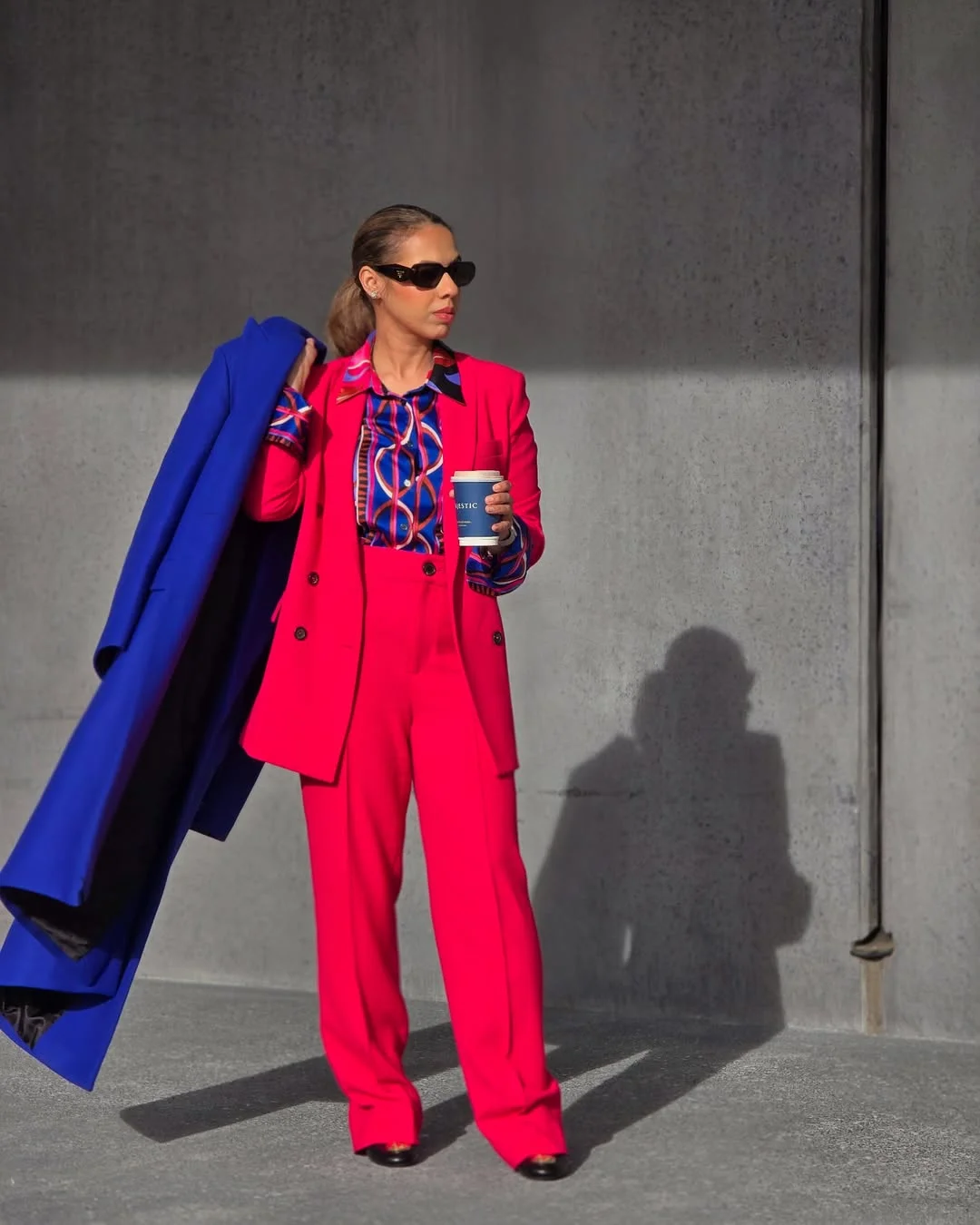 Bold Pink Power Suit With Contrasting Cobalt Coat