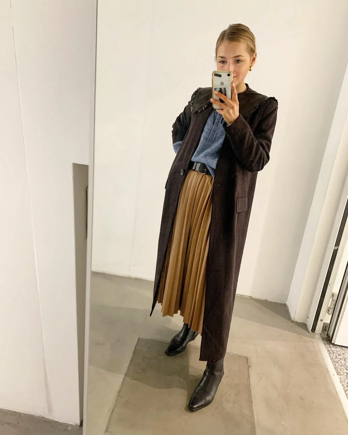 Brown Maxi Coat Over Pleated Midi Skirt