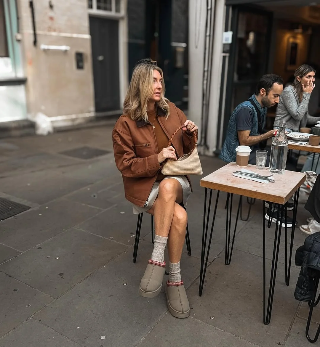 Brown Utility Jacket Over Sweater And Mini Skirt