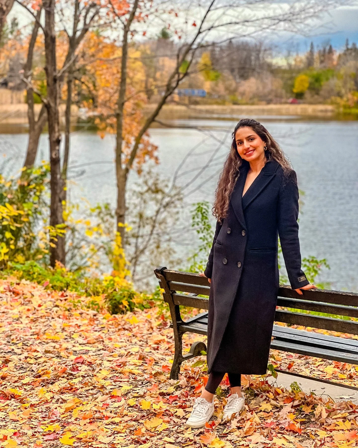Chic Black Coat With Sneakers Autumn Stroll