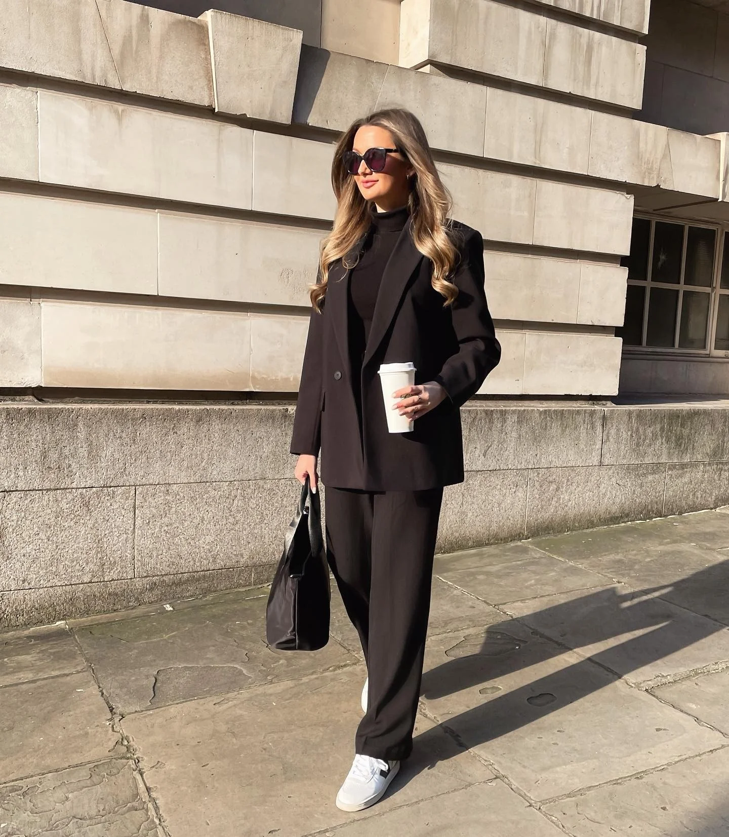 Chic Black Relaxed Suit With White Sneakers