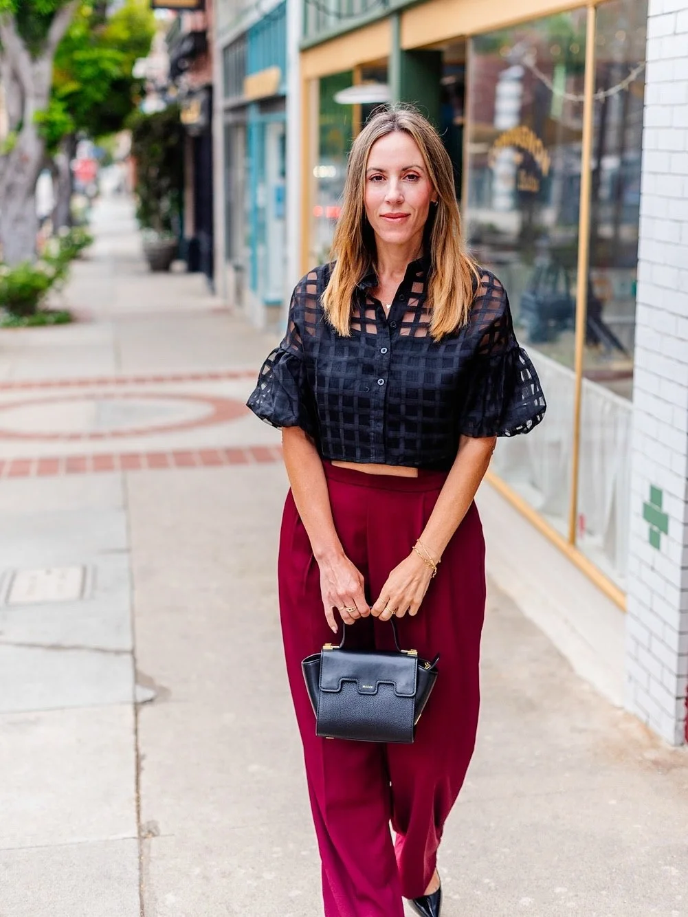 Chic Black Sheer Top With Burgundy Trousers Office Look