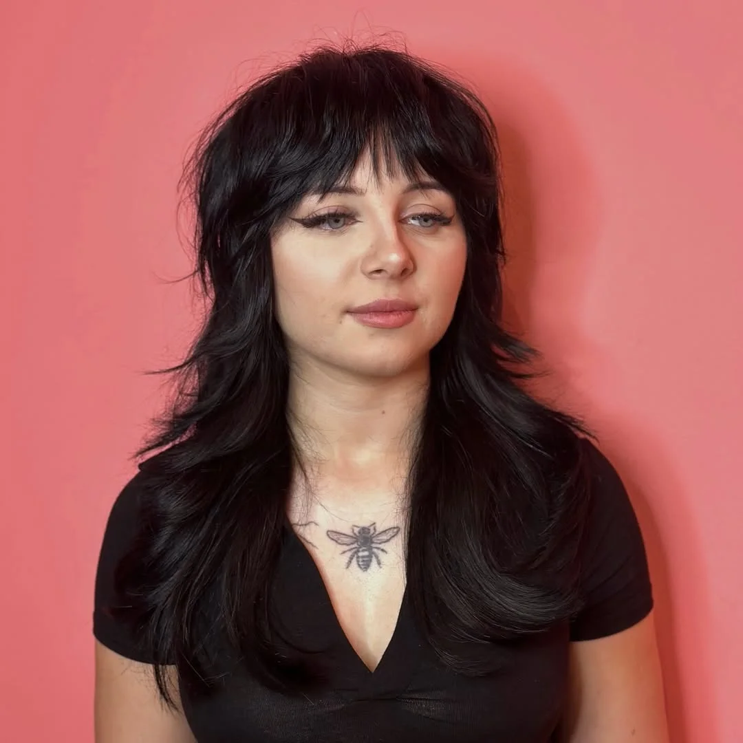 Choppy Jet Black Wolf Cut With Wispy Bangs