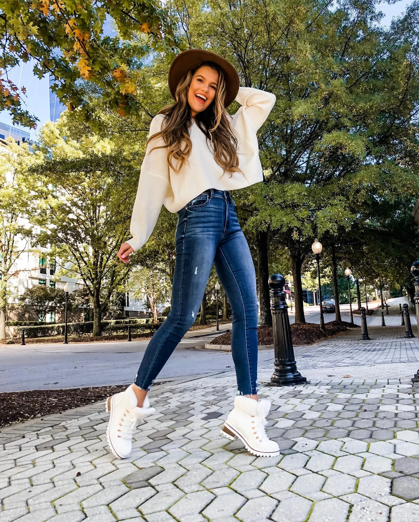 Cozy Cream Sweater And Distressed Denim Outfit