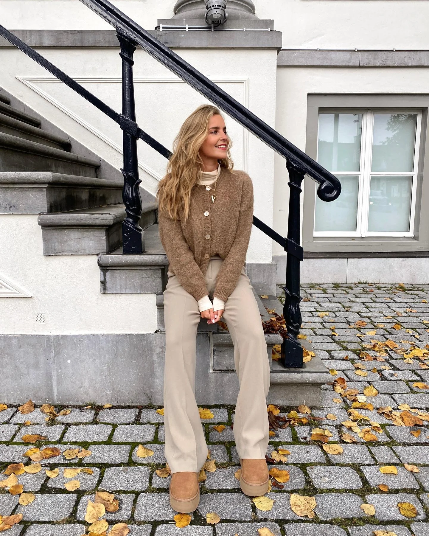 Cozy Mocha Cardigan With Cream Turtleneck And Beige Trousers
