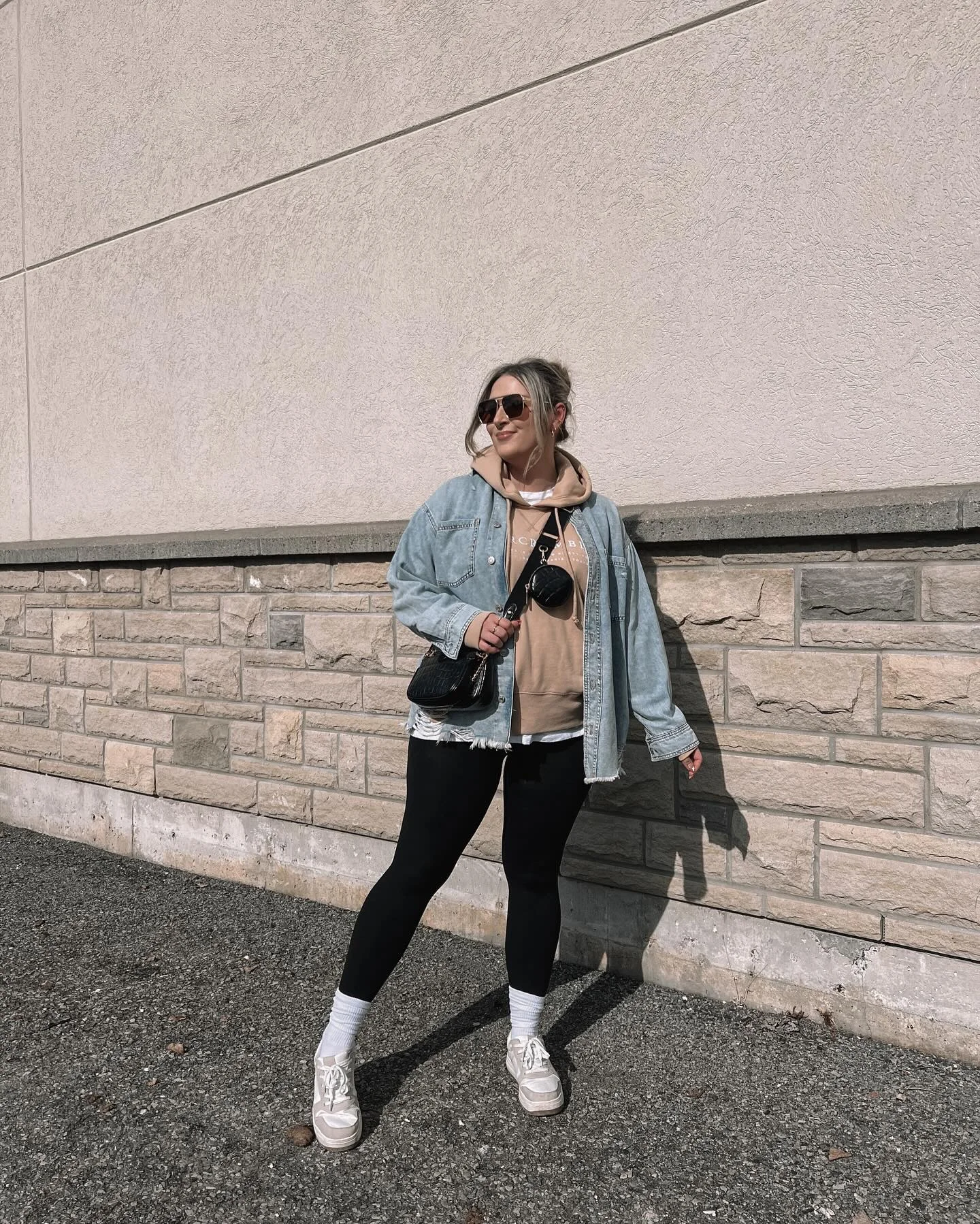 Denim Jacket Over Hoodie And Leggings Street Style