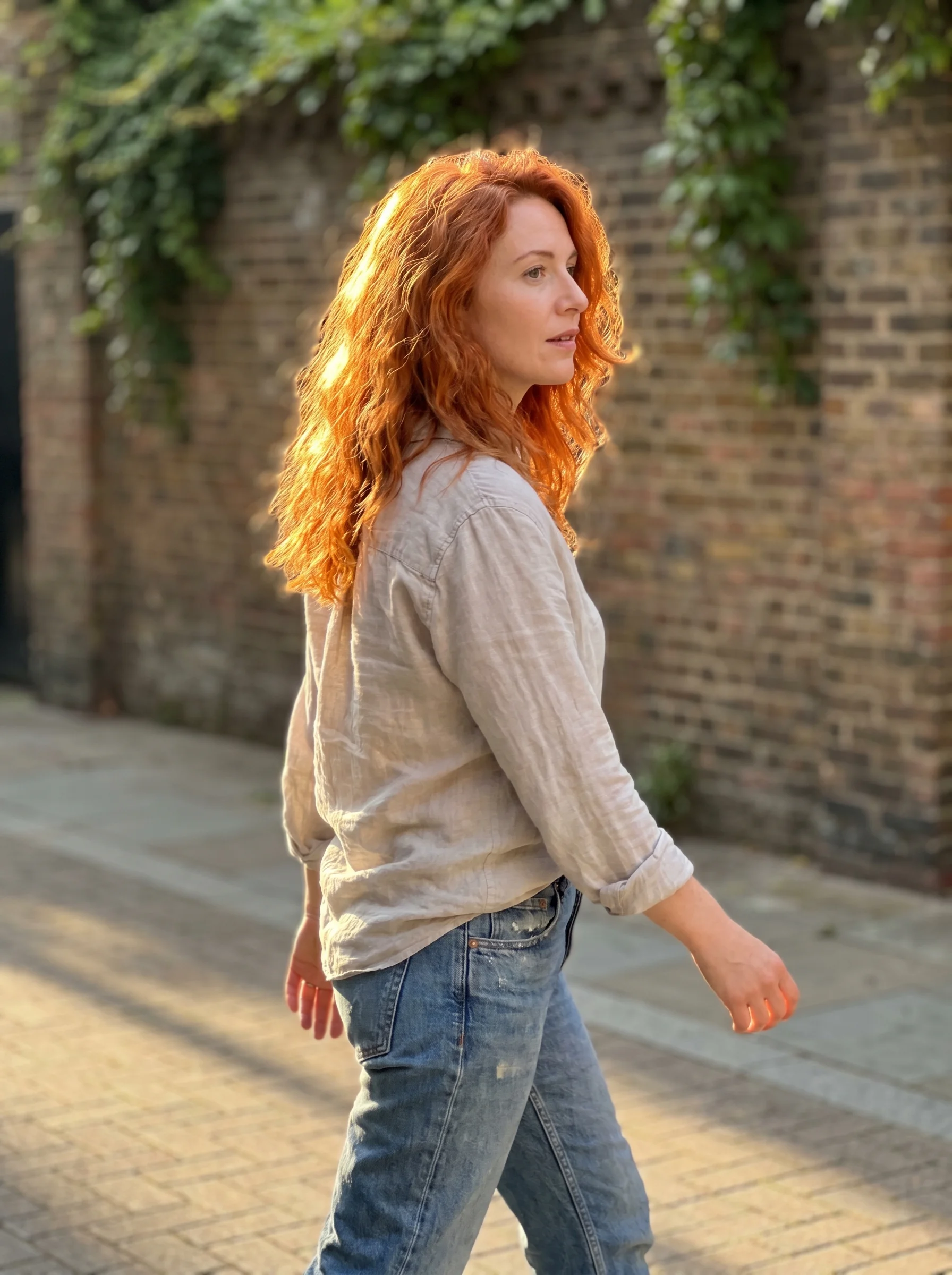 Earthy 'Terracotta Root Tap' for copper hair summer ideas 2026, featuring muted copper and vivid ginger tones for a natural, vibrant look.
