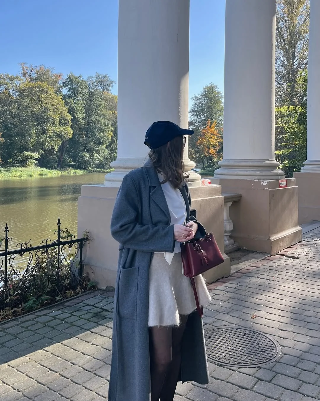 Longline Coat Over Textured Skirt Ensemble