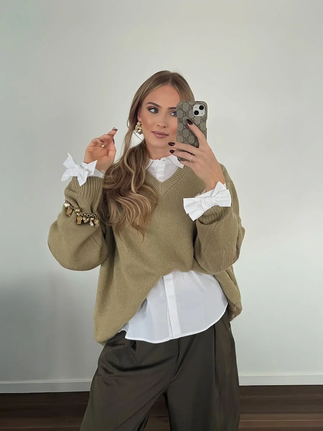 Oversized Knit Sweater Over Crisp White Shirt Outfit